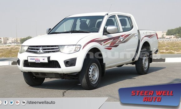 Medium with watermark mitsubishi l200 iles import dubai 1914