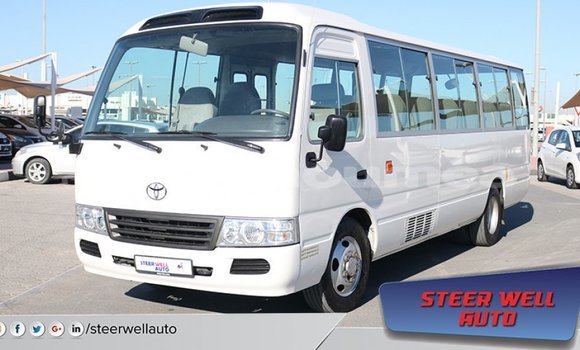 Acheter Import Voiture Toyota Coaster Blanc à Import - Dubai, Iles Acheter Import Voiture Toyota Coaster Blanc à Import - Dubai, Iles