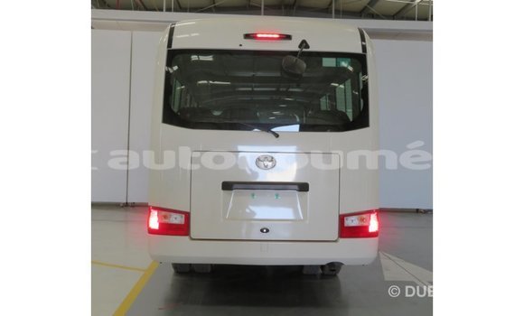 Acheter Import Voiture Toyota Coaster Blanc à Import - Dubai, Iles Acheter Import Voiture Toyota Coaster Blanc à Import - Dubai, Iles
