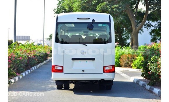 Acheter Import Voiture Toyota Coaster Blanc à Import - Dubai, Iles Acheter Import Voiture Toyota Coaster Blanc à Import - Dubai, Iles