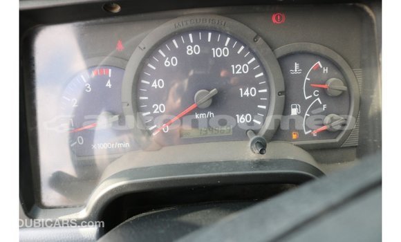 Buy Import Mitsubishi Carisma White Car in Import - Dubai in Iles