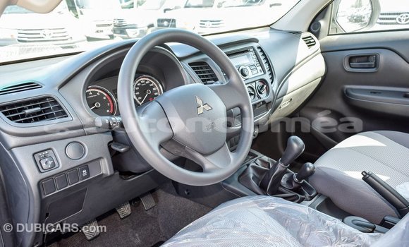 Buy Import Mitsubishi L200 White Car in Import - Dubai in Iles Buy Import Mitsubishi L200 White Car in Import - Dubai in Iles