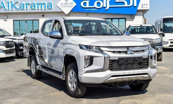 Buy Import Mitsubishi L200 White Car in Import - Dubai in Iles Buy Import Mitsubishi L200 White Car in Import - Dubai in Iles