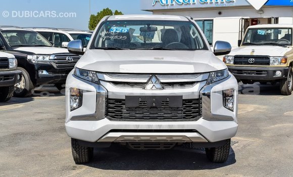 Buy Import Mitsubishi L200 White Car in Import - Dubai in Iles Buy Import Mitsubishi L200 White Car in Import - Dubai in Iles