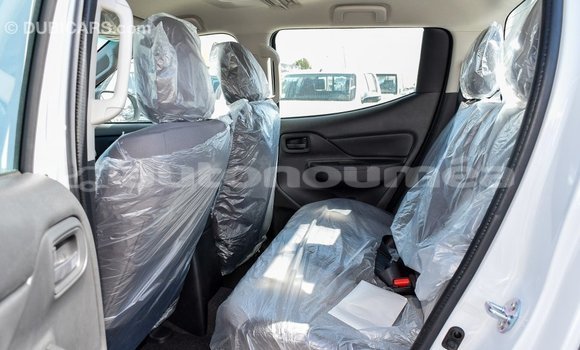 Buy Import Mitsubishi L200 White Car in Import - Dubai in Iles Buy Import Mitsubishi L200 White Car in Import - Dubai in Iles