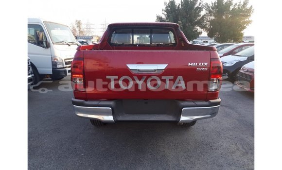 Buy Import Toyota Hilux Red Car in Import - Dubai in Iles Buy Import Toyota Hilux Red Car in Import - Dubai in Iles