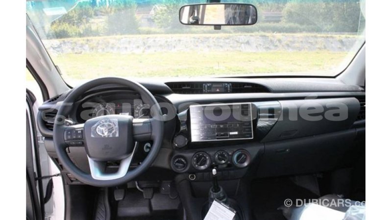 Big with watermark toyota hilux iles import dubai 2684
