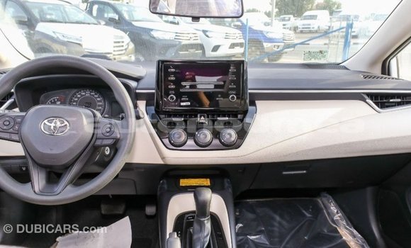 Buy Import Toyota Corolla White Car in Import - Dubai in Iles Buy Import Toyota Corolla White Car in Import - Dubai in Iles