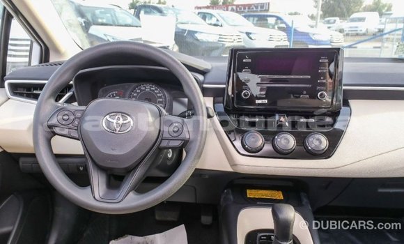Buy Import Toyota Corolla White Car in Import - Dubai in Iles Buy Import Toyota Corolla White Car in Import - Dubai in Iles