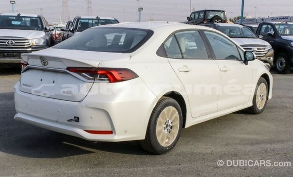 Buy Import Toyota Corolla White Car in Import - Dubai in Iles Buy Import Toyota Corolla White Car in Import - Dubai in Iles