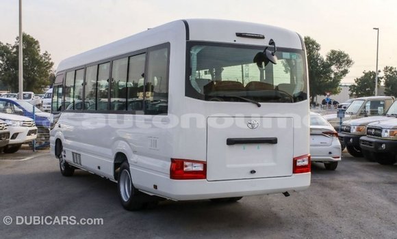 Acheter Import Voiture Toyota Coaster Blanc à Import - Dubai, Iles Acheter Import Voiture Toyota Coaster Blanc à Import - Dubai, Iles