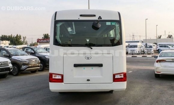 Acheter Import Voiture Toyota Coaster Blanc à Import - Dubai, Iles Acheter Import Voiture Toyota Coaster Blanc à Import - Dubai, Iles