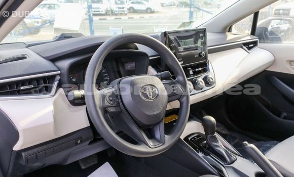 Buy Import Toyota Corolla White Car in Import - Dubai in Iles Buy Import Toyota Corolla White Car in Import - Dubai in Iles