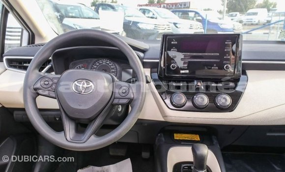 Buy Import Toyota Corolla White Car in Import - Dubai in Iles Buy Import Toyota Corolla White Car in Import - Dubai in Iles