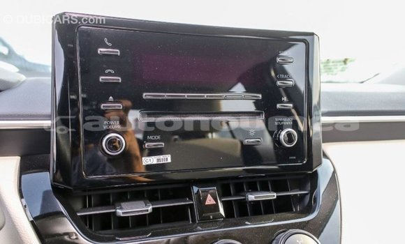 Buy Import Toyota Corolla White Car in Import - Dubai in Iles Buy Import Toyota Corolla White Car in Import - Dubai in Iles