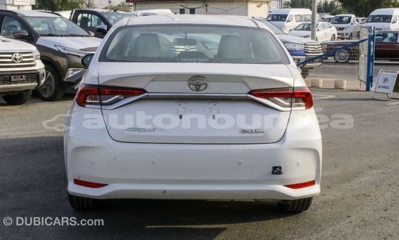 Buy Import Toyota Corolla White Car in Import - Dubai in Iles Buy Import Toyota Corolla White Car in Import - Dubai in Iles