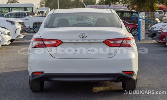 Buy Import Toyota Camry White Car in Import - Dubai in Iles Buy Import Toyota Camry White Car in Import - Dubai in Iles