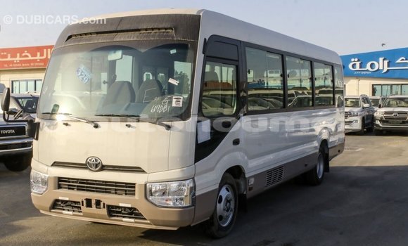 Acheter Import Voiture Toyota Coaster Blanc à Import - Dubai, Iles Acheter Import Voiture Toyota Coaster Blanc à Import - Dubai, Iles