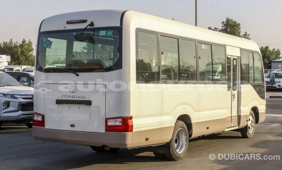 Acheter Import Voiture Toyota Coaster Blanc à Import - Dubai, Iles Acheter Import Voiture Toyota Coaster Blanc à Import - Dubai, Iles