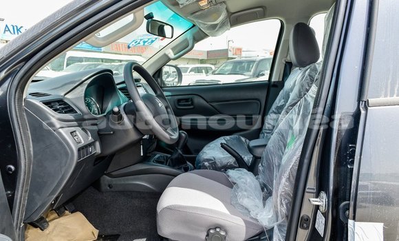 Buy Import Mitsubishi L200 Black Car in Import - Dubai in Iles Buy Import Mitsubishi L200 Black Car in Import - Dubai in Iles