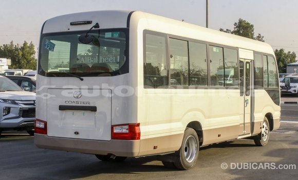 Acheter Import Voiture Toyota Coaster Blanc à Import - Dubai, Iles Acheter Import Voiture Toyota Coaster Blanc à Import - Dubai, Iles