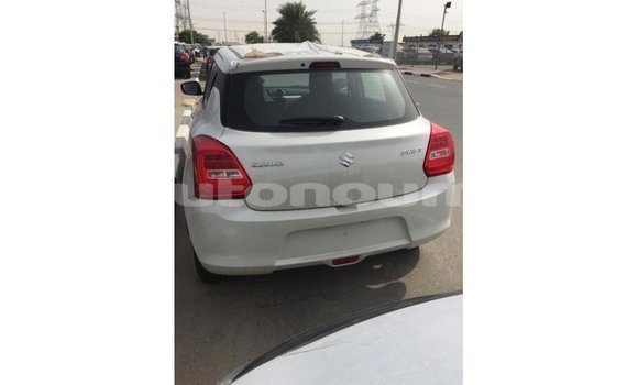 Buy Import Suzuki Swift White Car in Import - Dubai in Iles Buy Import Suzuki Swift White Car in Import - Dubai in Iles