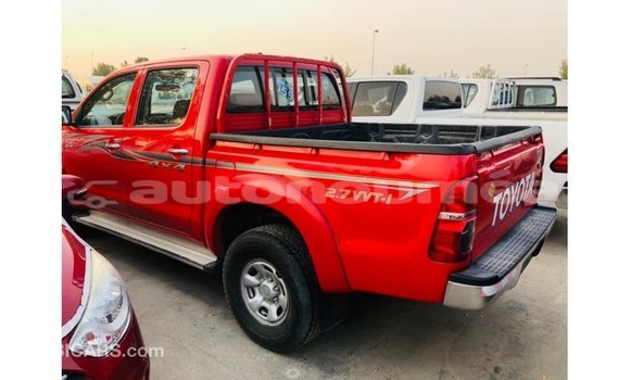Buy Import Toyota Hilux Red Car in Import - Dubai in Iles Buy Import Toyota Hilux Red Car in Import - Dubai in Iles