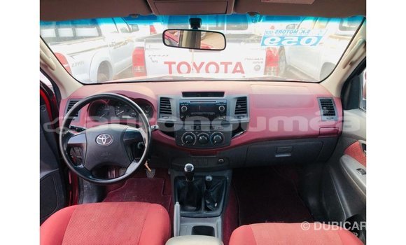 Buy Import Toyota Hilux Red Car in Import - Dubai in Iles Buy Import Toyota Hilux Red Car in Import - Dubai in Iles
