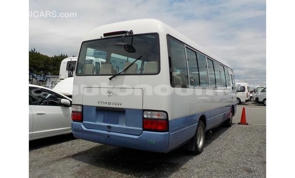 Acheter Import Voiture Toyota Coaster Blanc à Import - Dubai, Iles Acheter Import Voiture Toyota Coaster Blanc à Import - Dubai, Iles