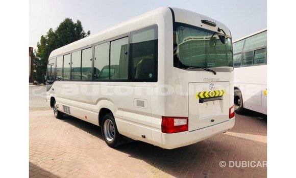 Acheter Import Voiture Toyota Coaster Blanc à Import - Dubai, Iles Acheter Import Voiture Toyota Coaster Blanc à Import - Dubai, Iles