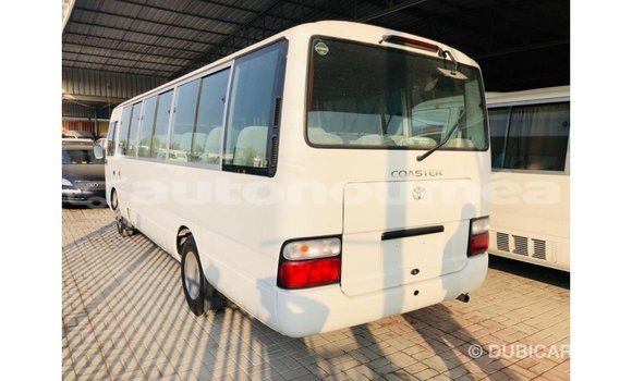 Acheter Import Voiture Toyota Coaster Blanc à Import - Dubai, Iles Acheter Import Voiture Toyota Coaster Blanc à Import - Dubai, Iles