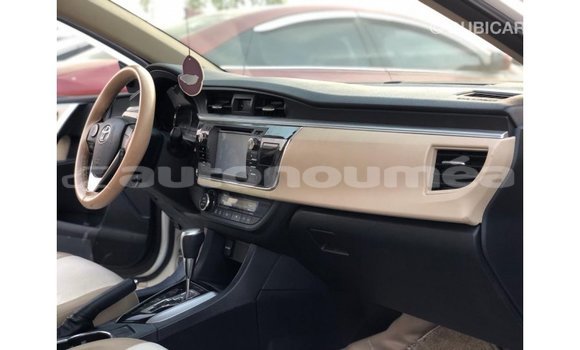 Buy Import Toyota Corolla White Car in Import - Dubai in Iles Buy Import Toyota Corolla White Car in Import - Dubai in Iles