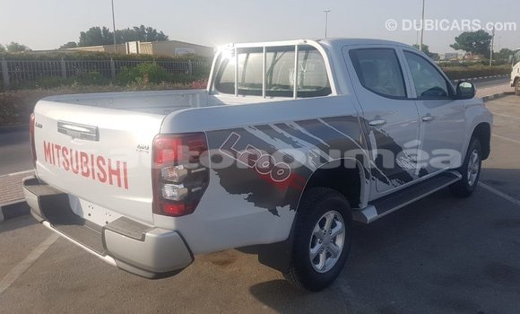 Buy Import Mitsubishi L200 White Car in Import - Dubai in Iles Buy Import Mitsubishi L200 White Car in Import - Dubai in Iles
