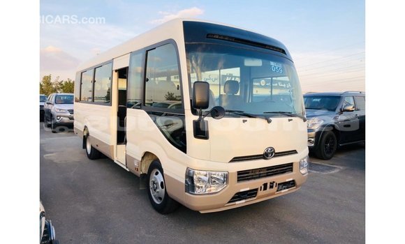 Acheter Import Voiture Toyota Coaster Blanc à Import - Dubai, Iles Acheter Import Voiture Toyota Coaster Blanc à Import - Dubai, Iles