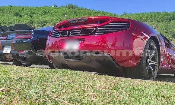 Acheter Import Voiture McLaren MP4-12C Rouge à Noumea, Sud Acheter Import Voiture McLaren MP4-12C Rouge à Noumea, Sud