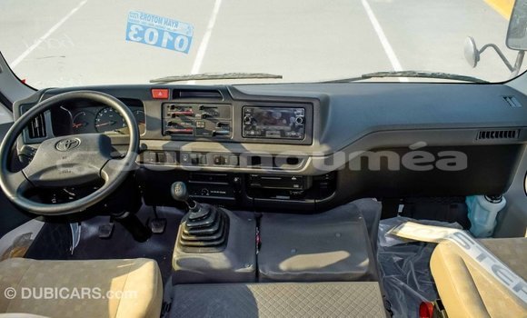 Buy Import Toyota Coaster White Car in Import - Dubai in Iles Buy Import Toyota Coaster White Car in Import - Dubai in Iles