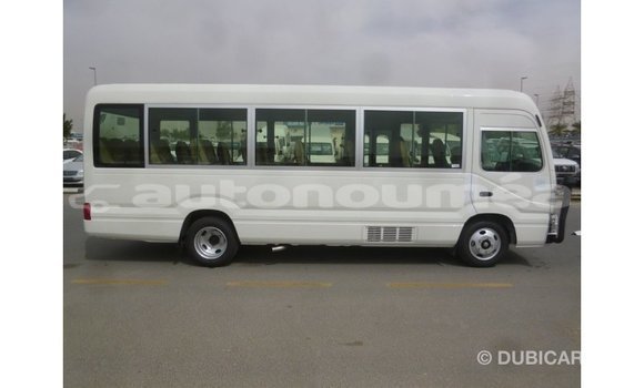 Acheter Import Voiture Toyota Coaster Blanc à Import - Dubai, Iles Acheter Import Voiture Toyota Coaster Blanc à Import - Dubai, Iles